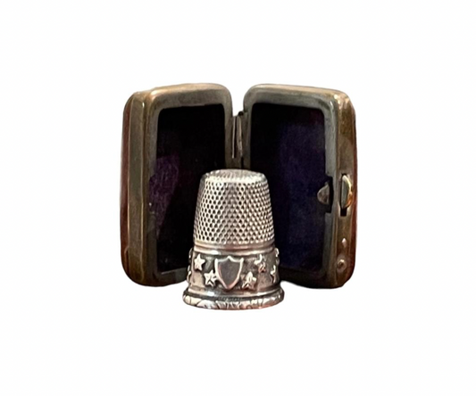 Souvenir thimble in a leather case